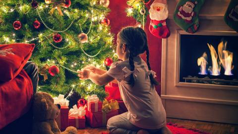 Beautiful little girl, Christmas tree